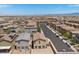 Aerial view showcasing a neighborhood with mountain views and community layout at 8261 Selenite St, Las Vegas, NV 89113