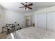 Spacious bedroom with closet, a ceiling fan, and an airy atmosphere at 8436 Kawala Dr, Las Vegas, NV 89128
