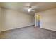 Bedroom featuring a ceiling fan, neutral carpet, and a closet at 8448 Cambria Cellars Ct, Las Vegas, NV 89139