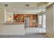 Open kitchen featuring granite counters, stainless steel appliances, and ample cabinet space at 8448 Cambria Cellars Ct, Las Vegas, NV 89139