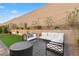 This backyard features ample seating, perfect for entertaining or relaxing in your own outdoor oasis at 8705 Fordster St, Las Vegas, NV 89166