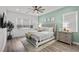 Inviting main bedroom showcasing a tufted headboard, coordinated decor, and a calming atmosphere at 8705 Fordster St, Las Vegas, NV 89166