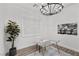 Well-lit office space featuring a glass desk and modern decor at 8705 Fordster St, Las Vegas, NV 89166