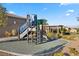 Community playground with climbing structure and slide, perfect for Gathering fun at 8705 Fordster St, Las Vegas, NV 89166