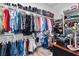 Spacious walk-in closet with organized shelving and ample storage for clothes and shoes at 8705 Fordster St, Las Vegas, NV 89166