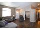 Bright living room features modern wood flooring, neutral paint colors, and ample natural light at 878 Samoy St, Las Vegas, NV 89110