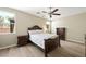 Serene bedroom with ample natural light, ceiling fan, and comfortable furnishings, ideal for rest and relaxation at 9104 Ashiwi Ave, Las Vegas, NV 89178