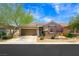 Charming single-story home featuring a well-maintained yard and attached two-car garage in a desirable community at 9104 Ashiwi Ave, Las Vegas, NV 89178