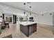 Open living space featuring kitchen, dining, and living area with lots of natural light at 9604 Stoney Mesa Ct, Las Vegas, NV 89139
