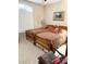 Bedroom with two beds, carpet, and neutral colored walls at 9621 Donner Springs Ave, Las Vegas, NV 89148