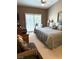Cozy primary bedroom boasts a large bed, dresser, and a peaceful atmosphere at 9621 Donner Springs Ave, Las Vegas, NV 89148