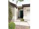 Charming home entrance with a decorative screen door and well-manicured landscaping at 9621 Donner Springs Ave, Las Vegas, NV 89148
