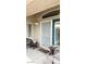 Charming front porch with a screen door, seating area, and ample natural light at 9621 Donner Springs Ave, Las Vegas, NV 89148