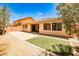 Large backyard features artificial turf, brick pavers, and a block wall at 9987 Shiloh Heights St, Las Vegas, NV 89178