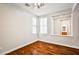 Bright bedroom with hardwood floors, an open floor plan, and neutral-toned walls at 9987 Shiloh Heights St, Las Vegas, NV 89178