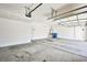 Spacious two car garage with overhead storage and epoxy flooring at 9987 Shiloh Heights St, Las Vegas, NV 89178