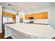 Bright kitchen boasts a large island, stainless steel appliances, and ample cabinet space at 9987 Shiloh Heights St, Las Vegas, NV 89178