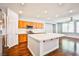 Spacious kitchen with a large island, stainless steel appliances, and abundant natural light at 9987 Shiloh Heights St, Las Vegas, NV 89178