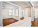 Bright living room with hardwood floors, an open floor plan, and neutral-toned walls at 9987 Shiloh Heights St, Las Vegas, NV 89178