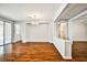 Bright, open living space with hardwood floors, offering a seamless transition to other areas at 9987 Shiloh Heights St, Las Vegas, NV 89178