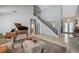 Grand foyer with high ceilings, a piano, ornate ironwork, and a staircase to the second floor at 10249 Wisteria Hills Ct, Las Vegas, NV 89135
