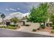 Beautiful home featuring desert landscaping, a three-car garage, and a spacious driveway at 10249 Wisteria Hills Ct, Las Vegas, NV 89135