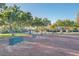 Enjoy the outdoors with horseshoe pit, benches, and park landscaping with mature trees at 10249 Wisteria Hills Ct, Las Vegas, NV 89135