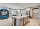 Well-equipped kitchen with a spacious island and stainless steel appliances at 10249 Wisteria Hills Ct, Las Vegas, NV 89135