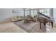 Comfortable living area with a grand piano and a cozy seating arrangement at 10249 Wisteria Hills Ct, Las Vegas, NV 89135