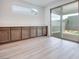 Dining area featuring built-in cabinets and a sliding glass door to the backyard at 10465 Smokey Mariposa, Las Vegas, NV 89166