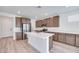 Contemporary kitchen with a center island, stainless appliances, and plentiful cabinetry at 10465 Smokey Mariposa, Las Vegas, NV 89166
