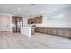 Modern kitchen with stainless steel appliances, an island, and ample counter space at 10465 Smokey Mariposa, Las Vegas, NV 89166