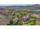 High angle scenic view overlooking the golf course, lake, mountains, and residential building at 12 Strada Di Circolo, Henderson, NV 89011