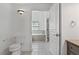 Bathroom featuring tile floor, soaking tub, and vanity with granite top at 12 Strada Di Circolo, Henderson, NV 89011