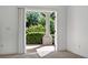 Bedroom with carpet and sliding doors offer lots of natural light and access to patio at 12 Strada Di Circolo, Henderson, NV 89011