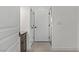 Hallway view of built-in storage and door leading to a bedroom at 12 Strada Di Circolo, Henderson, NV 89011