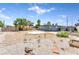 Spacious backyard features desert landscaping, privacy fence, and a patio at 1713 E Bonanza Rd, Las Vegas, NV 89101