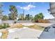 Large fenced backyard with ample space and hardscape accents at 1713 E Bonanza Rd, Las Vegas, NV 89101