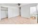 Bedroom with closet, tiled flooring, and a view of the ensuite bathroom at 1713 E Bonanza Rd, Las Vegas, NV 89101