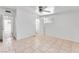 Large bedroom with tiled floors and natural light from a bright window at 1713 E Bonanza Rd, Las Vegas, NV 89101