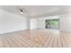 Spacious living room featuring tile floors and a large glass sliding door to the backyard at 1713 E Bonanza Rd, Las Vegas, NV 89101