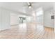 Spacious living room featuring tile floors, white walls, and a sliding glass door at 1713 E Bonanza Rd, Las Vegas, NV 89101