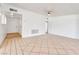 Large open living room featuring tile floors, white walls and a ceiling fan at 1713 E Bonanza Rd, Las Vegas, NV 89101