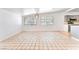 Spacious living area with large windows providing natural light and tile flooring at 1713 E Bonanza Rd, Las Vegas, NV 89101