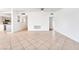Bright living room features tile flooring, neutral walls, and open layout perfect for entertaining at 1713 E Bonanza Rd, Las Vegas, NV 89101