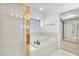 Bathroom showcasing a glass shower and large tub for a relaxing experience at 1951 Moyer Dr, Henderson, NV 89074