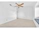 Minimalist bedroom with plush carpet and window seat at 1951 Moyer Dr, Henderson, NV 89074