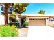 Charming single-story home with a well-maintained front yard and desert landscaping at 1951 Moyer Dr, Henderson, NV 89074