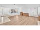 Inviting living room showcasing hardwood flooring, natural light, and a welcoming entryway at 1951 Moyer Dr, Henderson, NV 89074