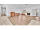 Spacious living room with hardwood flooring, fireplace and white walls for a bright and airy feel at 1951 Moyer Dr, Henderson, NV 89074